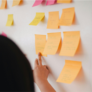 Research post it notes on a wall